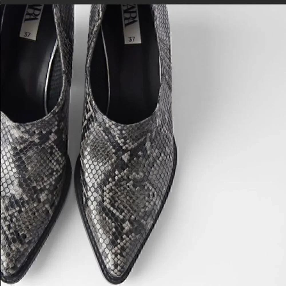 ZARA animal print cowboy heeled ankle boots